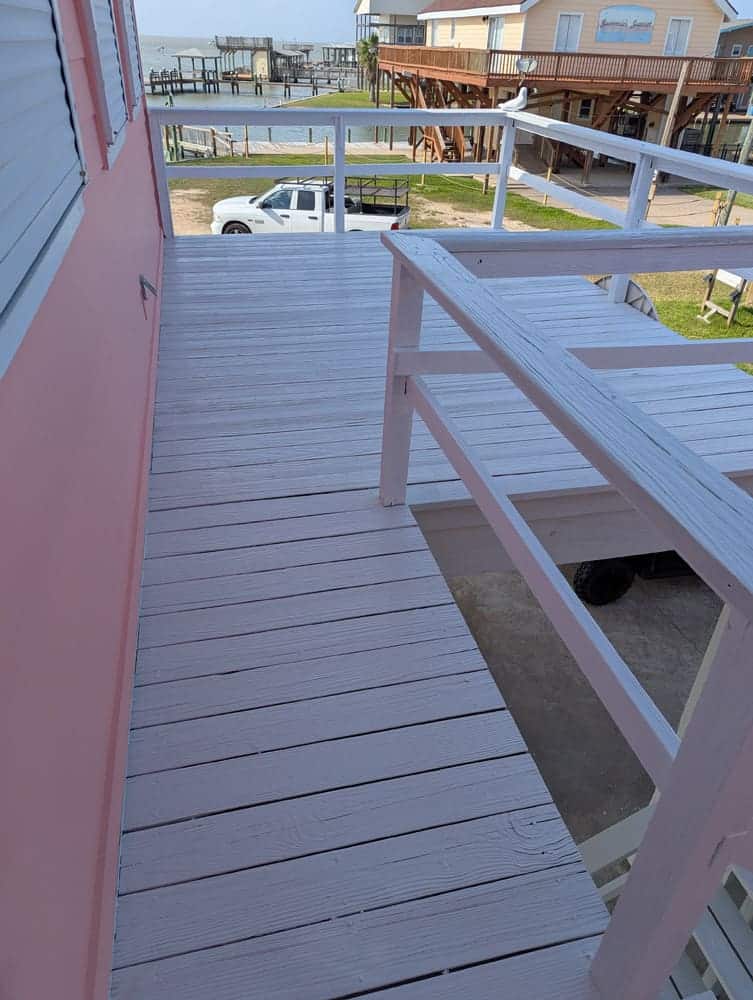 Home exterior with freshly stained fence